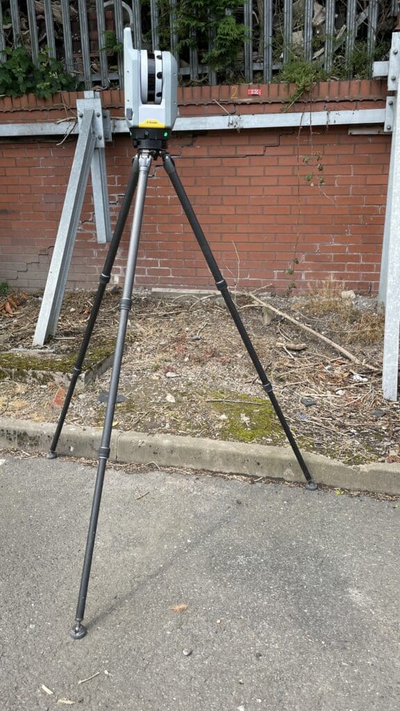 Laser scanning a subsiding wall to check for verticality