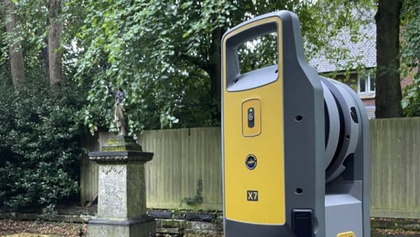 A laser scanner captures a topographical survey of a churchyard.