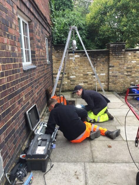 Workers conducting a CCTV drainage survey
