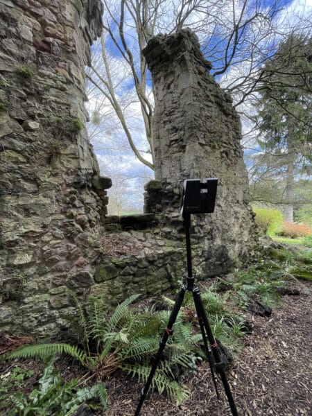 Matterport Pro 3 Camera in front of a stone structure